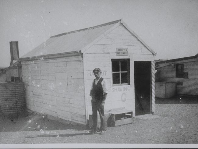 A barber shop in Tarcoola, around 1900, offering haircuts and boot repairs. Source: State Library of SA B3077