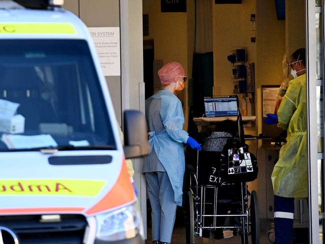 SYDNEY, AUSTRALIA - NewsWire Photos SEPTEMBER 6, 2021: Frontline emergency workers attend to the emergency department at St Vincent Hospital in Sydney as the hospitalisation rate is expected to soar to at least one in 10 people in the coming weeks.Picture: NCA NewsWire / Jeremy Piper