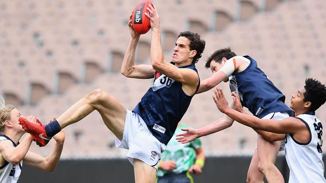 Ben King marks during Vic Metro’s clash against Vic Country.