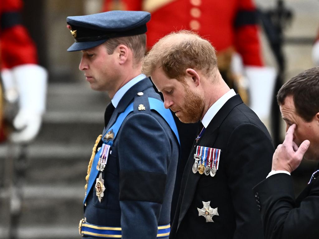 Prince William, Prince of Wales, and Britain's Prince Harry, Duke of Sussex arrive at Westminster Abbey.