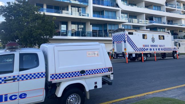 Police vehicles outside the Sapphire at The Broadwater building. Photo: Jacob Miley.