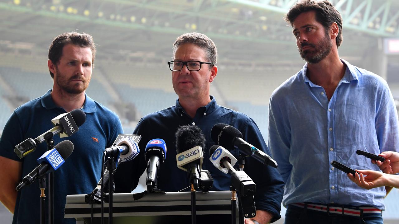 AFLPA President Patrick Dangerfield, AFLPA CEO Paul Marsh and AFL CEO Gillon McLachlan. (AAP Image/James Ross)