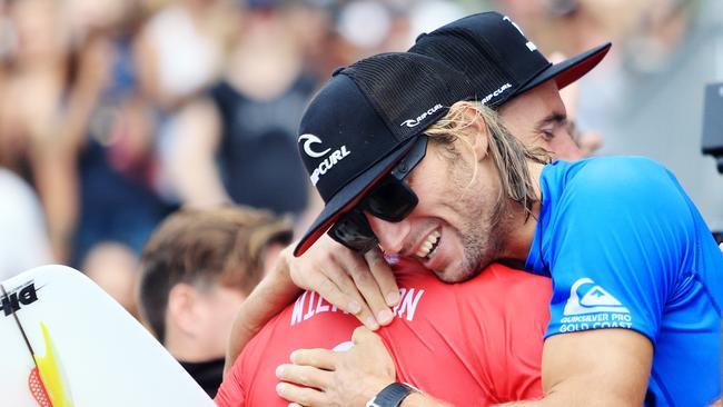 Owen Wright embraces runner-up Matt Wilkinson.