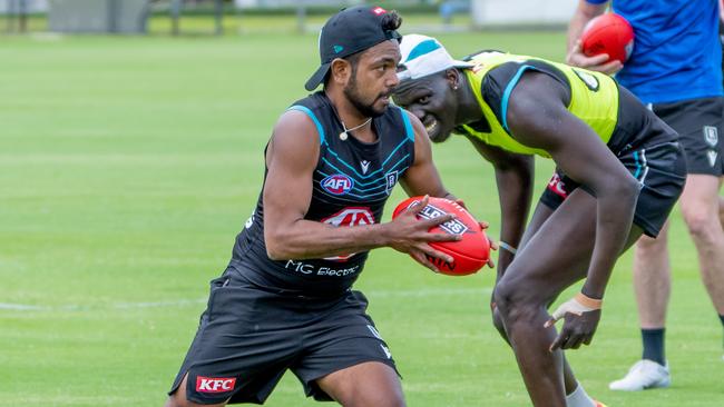 Junior Rioli goes through his paces on the training track this week. Picture: PAFC/Michael Sullivan