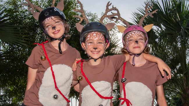 Marjorie Hackenberg, Tallulah Johns Long and Flora Hackenberg as thousands of Territorians braved the tropical heat for A Very Darwin Christmas Pageant. Picture: Pema Tamang Pakhrin