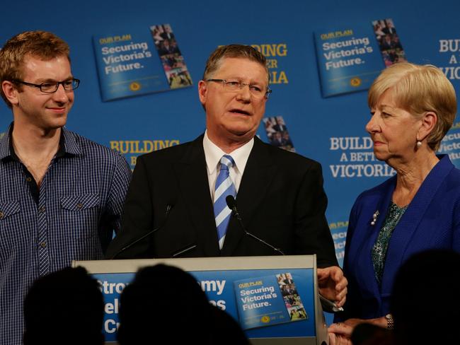 Defeated: Premier Denis Napthine with son Tom and wife Peggy, congratuled his successor Picture: Andrew Tauber
