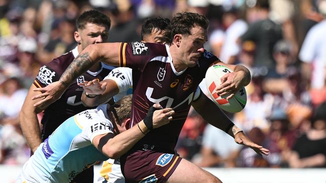 Kobe Hetherington of the Broncos takes on the defence during the 2025 NRL Pre-Season Challenge match between Brisbane Broncos and Gold Coast Titans at Clive Berghofer Stadium on February 16, 2025 in Toowoomba, Australia. (Photo by Bradley Kanaris/Getty Images)