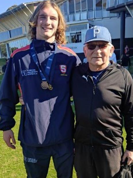 Dyson Sharp with AFL talent ambassador Kevin Sheehan after winning the Kevin Sheehan Medal as best player at the AFL under-16 national championships. Picture: Supplied