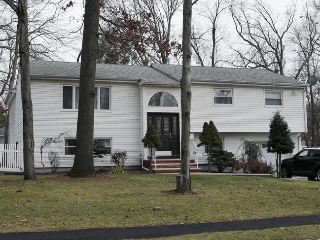 In this Jan. 5, 2017, photo, the home of Dan Zhong is seen in Livingston, N.J. Zhong, a businessman imprisoned on charges that he forced immigrant laborers to do construction at Chinese diplomatic facilities in the U.S. wants permission to turn his New Jersey home into a private jail where he can comfortably await trial. (AP Photo/Mel Evans)