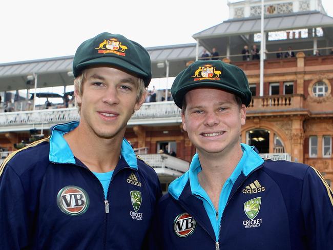 Tim Paine (L) made his Test debut with Steve Smith in 2010.