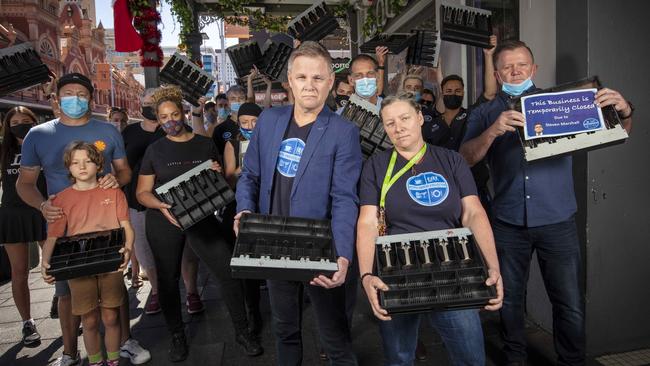 Hospo Owners Collective co-founders Jason Makarenko and Simone Douglas with other hospo owners, staff and family members. Picture: NCA NewsWire / Emma Brasier