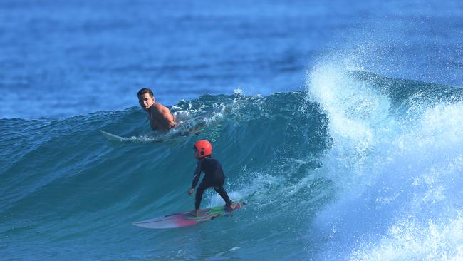 Surfers try their luck at the always crowded Snapper Rocks. Picture: Scott Fletcher