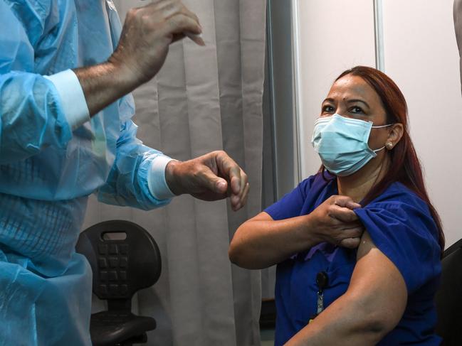 An inside look at Melbourne Airport's vaccination hub, where an international departure lounge was transformed into a mini-hospital in less than a week. About 900 jabs have been delivered there so far this week. Supplied:  WESTERN HEALTH Penny Stephens