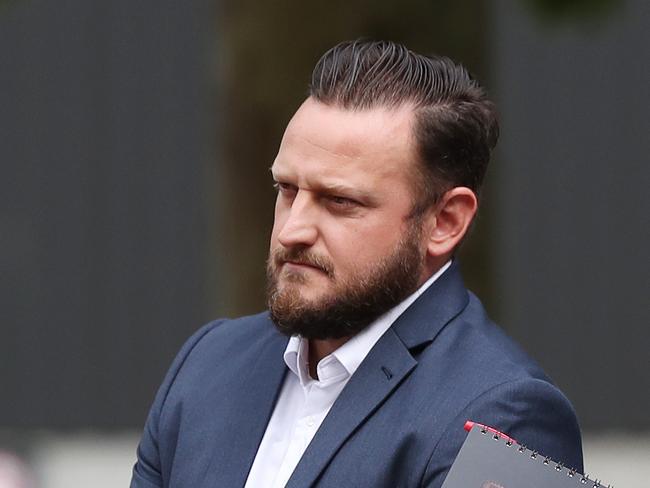 Civilian police employee Luke Deger at Wyong Local Court, Friday, December 17, 2021 for impersonating a police officer. Picture: Sue Graham