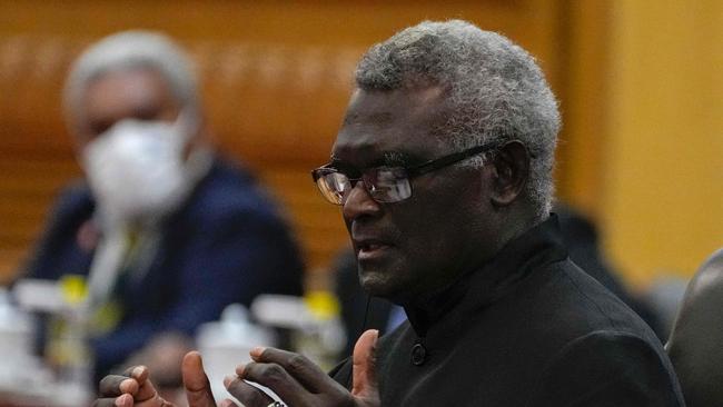 Manasseh Sogavare during a meeting with China's Premier Li Qiang at the Great Hall of the People in Beijing in 2023. Picture: AFP