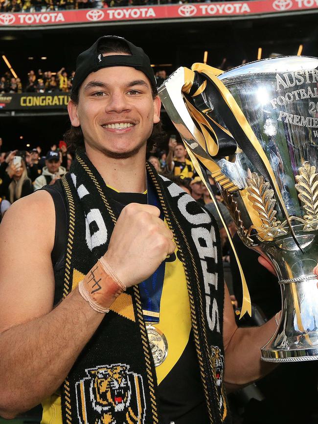 Daniel Rioli with Richmond’s 2019 premiership trophy. Picture: Mark Stewart