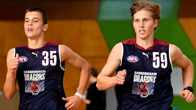 MELBOURNE, AUSTRALIA - MARCH 11: Ned Maginness and Charlie Harrop of the Sandringham Dragons in action during the 2023 Coates Talent League Boys Testing Day at Maribyrnong College on March 11 in Melbourne, Australia. (Photo by Josh Chadwick/AFL Photos via Getty Images)