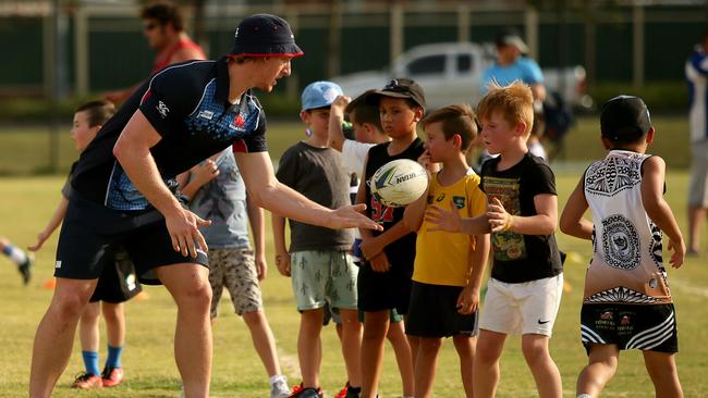 Waratahs Brad Wilkin puts the kids through their paces. Picture: Justin Sanson.