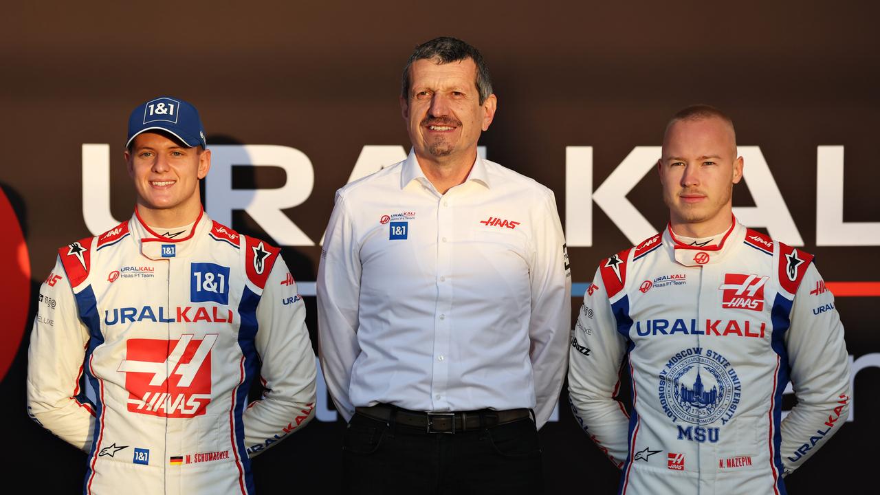 Nikita Mazepin of Russia, picture on the right, alongside Haas F1 Team Principal Guenther Steiner and Mick Schumacher of Germany. Photo by Mark Thompson/Getty Images