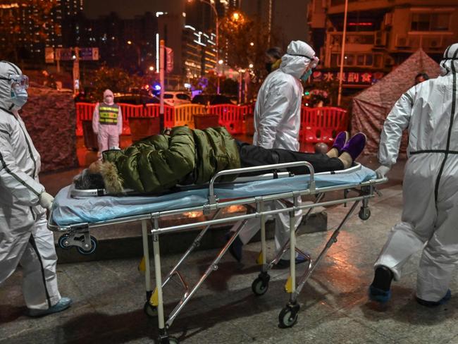 Staff arrive at Wuhan Red Cross Hospital in Wuhan. Picture: AFP