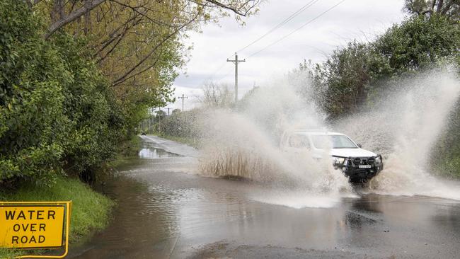 Flooding across Old Kurrajong Rd. Picture: Monique Harmer