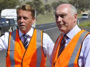 The former (now shadow) Queensland Minister for Transport and Main Roads Scott Emerson and Minister for Infrastructure and Regional Development Warren Truss met at the start of the works last year. Picture: Andrew Backhouse