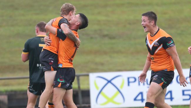 The Tigers celebrating Cooper Tippett’s try. Picture: Sue Graham