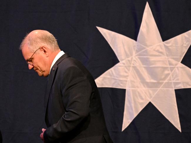 TOPSHOT - Australia's Prime Minister Scott Morrison leaves from a Liberal election night event after the Australian general election in Sydney on May 21, 2022. (Photo by Saeed KHAN / AFP)