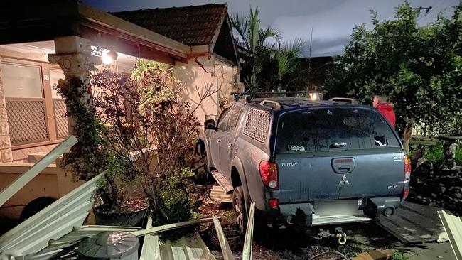 The car which ploughed through the Rosewater fence and into the front yard. Picture: Marianne Cope