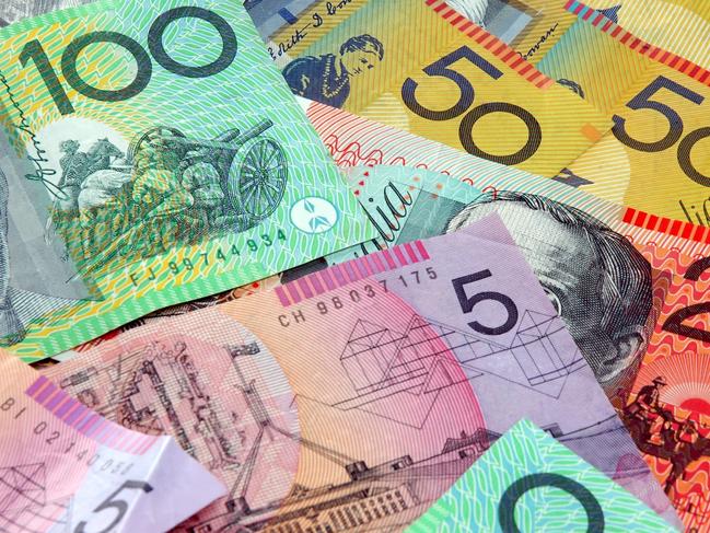 Australian notes scattered on a table. Notes, currency, generic money