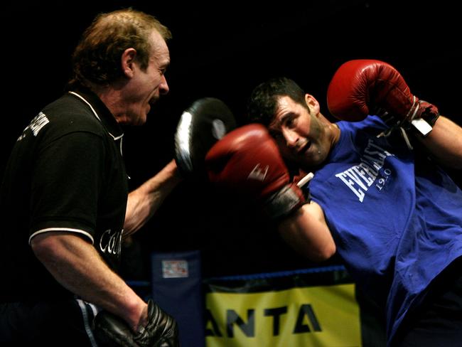 FILE: Enzo Calzaghe, the father of former world boxing champion Joe Calzaghe, has died aged 69. NEWPORT, WALES - MARCH 26:  Joe Calzaghe spars with his father and trainer Enzo Calzaghe during his open workout prior to his fight against Bernard Hopkins in Las Vegas, Nevada in April. The workout was on March 26, 2008 at the Newbridge Gym in Newbridge, South Wales. (Photo by John Gichigi/Getty Images)