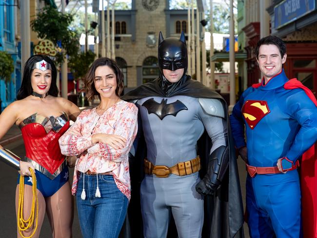 Giaan Rooney with DC superheroes at Warner Bros Movie World