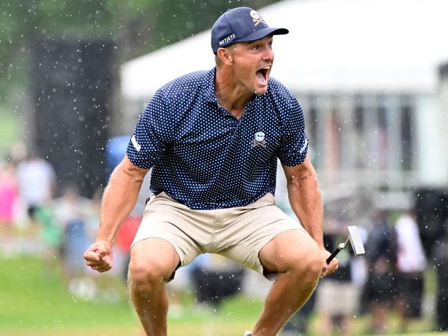 WHITE SULPHUR SPRINGS, WEST VIRGINIA - AUGUST 06: Bryson DeChambeau of the United States celebrates his birdie putt on the 18th hole with a record 58 to win the LIV Golf Invitational - Greenbrier at The Old White Course on August 06, 2023 in White Sulphur Springs, West Virginia.   Eakin Howard/Getty Images/AFP (Photo by Eakin Howard / GETTY IMAGES NORTH AMERICA / Getty Images via AFP)