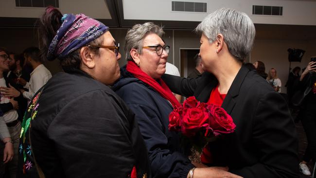 Penny Wong consoles Yes supporters Joyleen Thomas and her daughter Khatija Thomas in Adelaide. Picture: Brett Hartwig