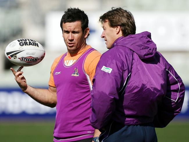 Matthew Johns has a chat with coach Craig Bellamy Pic. Colleen Petch