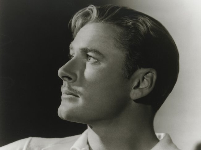 <p>Errol Flynn (1936).</p> <strong>Hair-razing brush with history</strong>