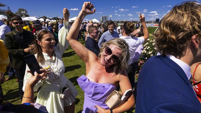 Racegoers celebrate after James Mcdonald and Verry Elleegant win. Picture: Getty Images