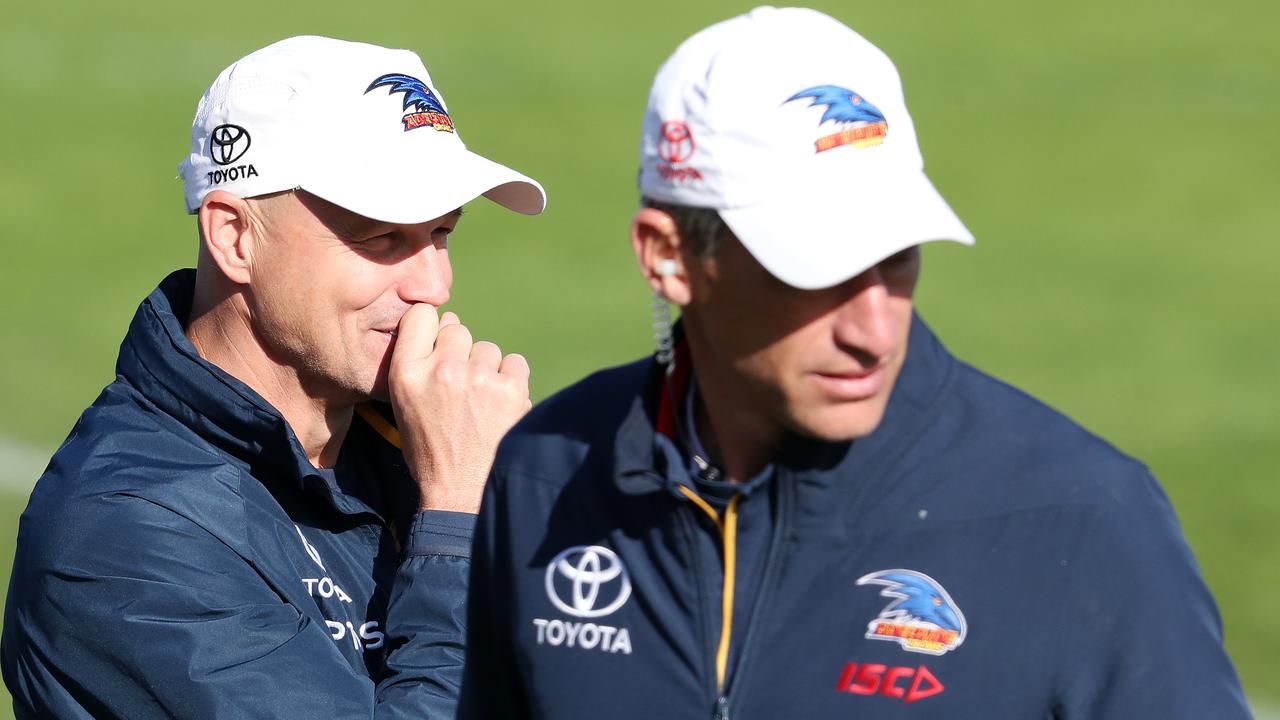 Crows ruck coach Matthew Clarke (right) is expected to coach the AFLW team again next season. Picture: Sarah Reed