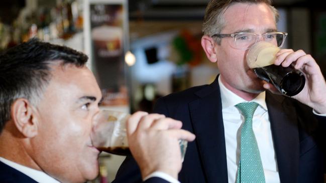 NSW Deputy Premier John Barilaro and Treasurer Dominic Perrottet mark the further easing of COVID-19 restrictions for indoor venues, pubs and clubs during St Patrick’s Day celebrations. Picture: Jeremy Piper