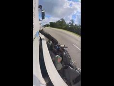 Rider hits two vehicles in crazy motorbike crash