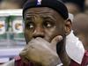 Miami Heat forward LeBron James watches action against the San Antonio Spurs during the second half in Game 1 of the NBA basketball finals on Thursday, June 5, 2014 in San Antonio. (AP Photo/Eric Gay)