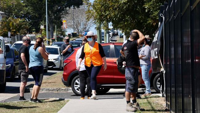 Parents and staff at the gates of St Thomas More College at Sunnybank. Picture: NewsWire / Sarah Marshall