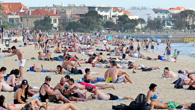 Melbourne beats the heat. People cool off at St Kilda beach. Picture: Mark Stewart