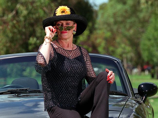 FEBRUARY 24, 2000 : Brothel madam and Lord Mayoral aspirant Stormy Summers with her sports car in Adelaide 24/02/00. pic Tony Lewis.