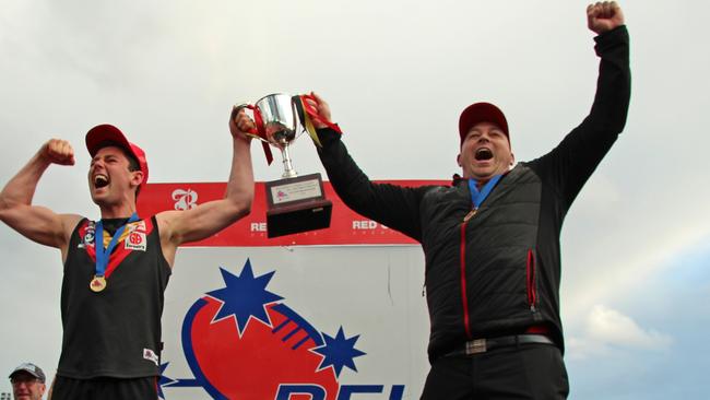 Travis Hodgson (right) and Bacchus Marsh captain Tyson Shea celebrate the club’s 2016 grand final victory. Picture: Aaron Cook