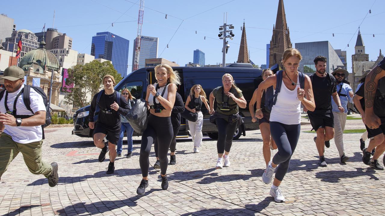 Hunted contestants scatter after they’re dropped at Melbourne’s Federation Square.