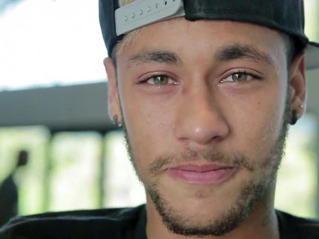 Handout TV image released by the Brazilian football Confederation (CBF) of Brazil's star striker Neymar crying as he adresses the Brazilian fans before his departure for his home in Guaruya, at Granja Comary training center in Teresopolis, Rio de Janeiro state, Brazil, on July 5, 2014. Injured Brazil star Neymar departed his team's training base in Terespolis in a helicopter on Saturday and headed home to Sao Paulo, after his World Cup ended in agony on Friday night. AFP PHOTO/CBF-TV/HO RESTRICTED TO EDITORIAL USE - MANDATORY CREDIT "AFP PHOTO/CBF-TV/HO" - NO MARKETING NO ADVERTISING CAMPAIGNS - DISTRIBUTED AS A SERVICE TO CLIENTS