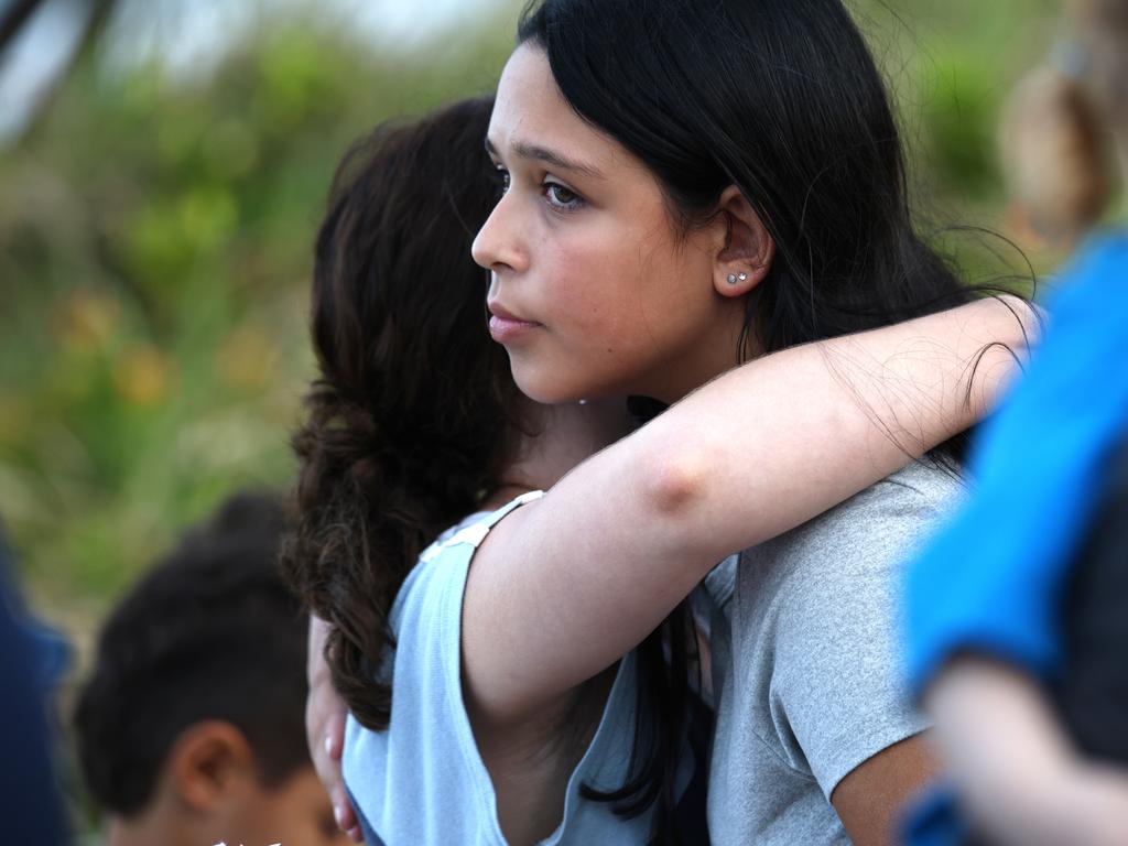 Hundreds of people have gathered at Bribie Island for a vigil to honour 17-year-old shark attack victim Charlize Zmuda. Picture: David Clark