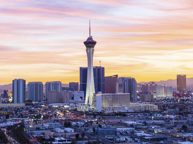 The Stratosphere hotel towers over Sin City and pokes fun at the glitzy side of Vegas.