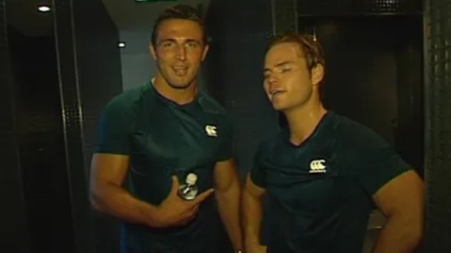 Mr Cox interviewed former NRL player Sam Burgess (left) during his stint as a sports presenter for Channel 7. Picture: YouTube